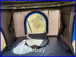 Roof top clam shell tent FREE shipping to local terminal B grade scratch/blem