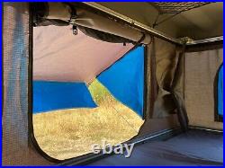 Roof top clam shell tent FREE shipping to you NEW repack
